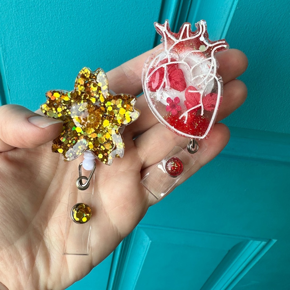 Flower or heart badge reels